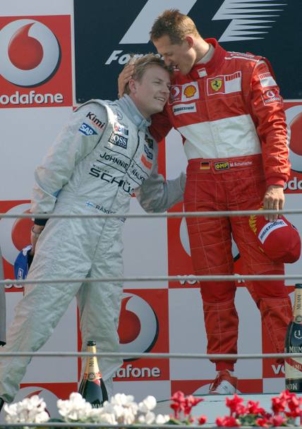 Gp Italia 2006. Michael Schumacher e Kimi Raikkonen sul podio di Monza (Omega)